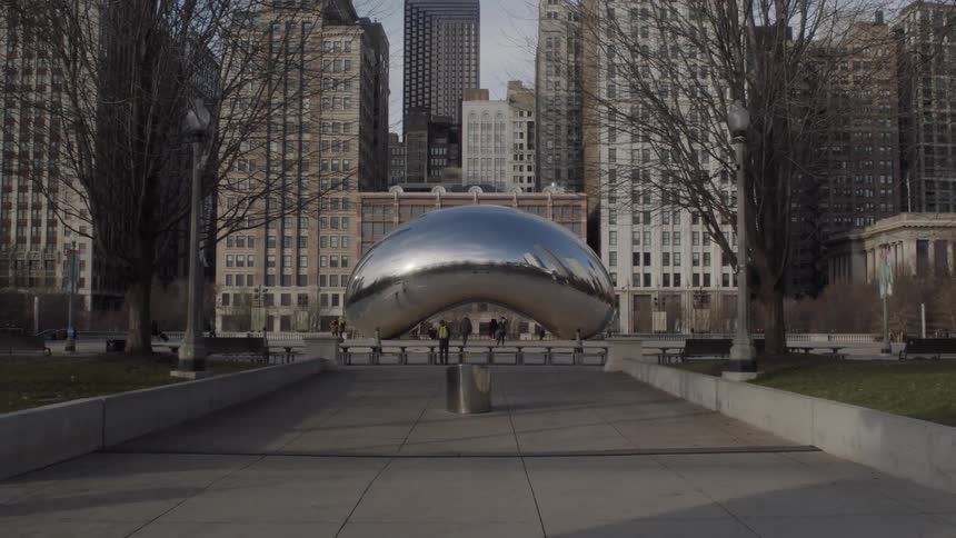 View of a large shiny structure in the middle of a city