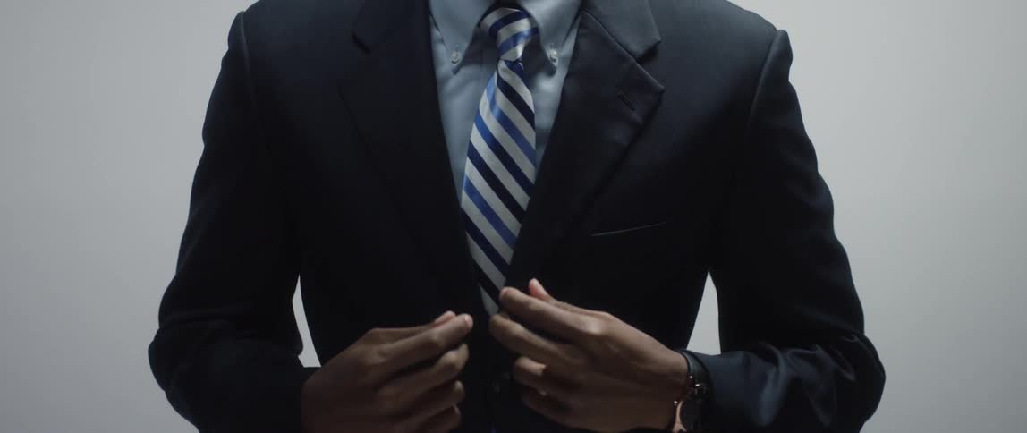 A person wearing a suit