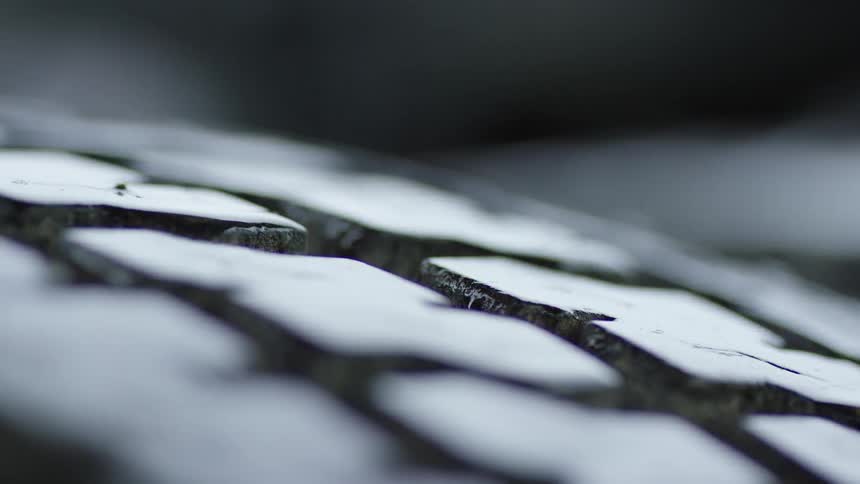 Close-up of tired threads coming in and out of focus