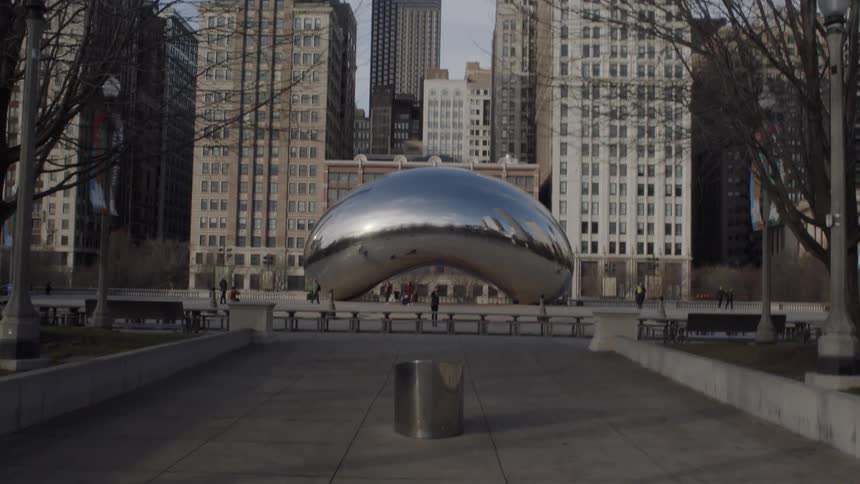 View of a large shiny structure in the middle of a city
