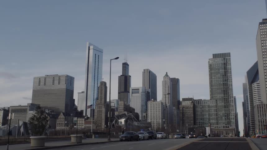 A cityscape is shown on a clear day