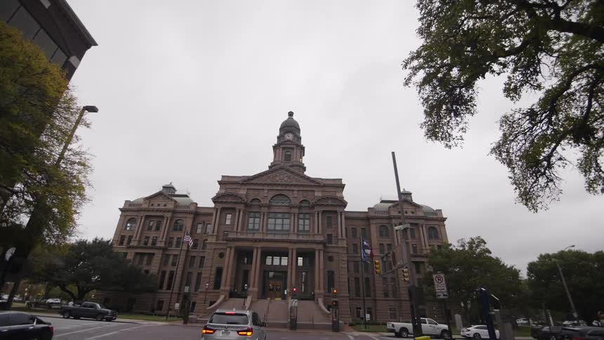 A large stone building near a street