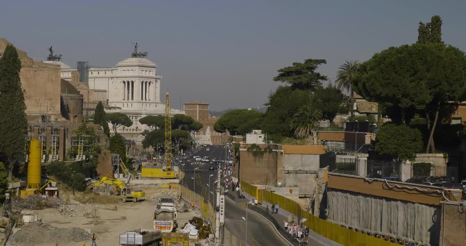 A construction site is shown in a city