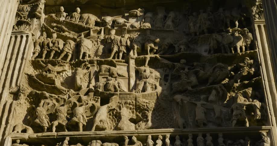 Carvings cover a stone surface