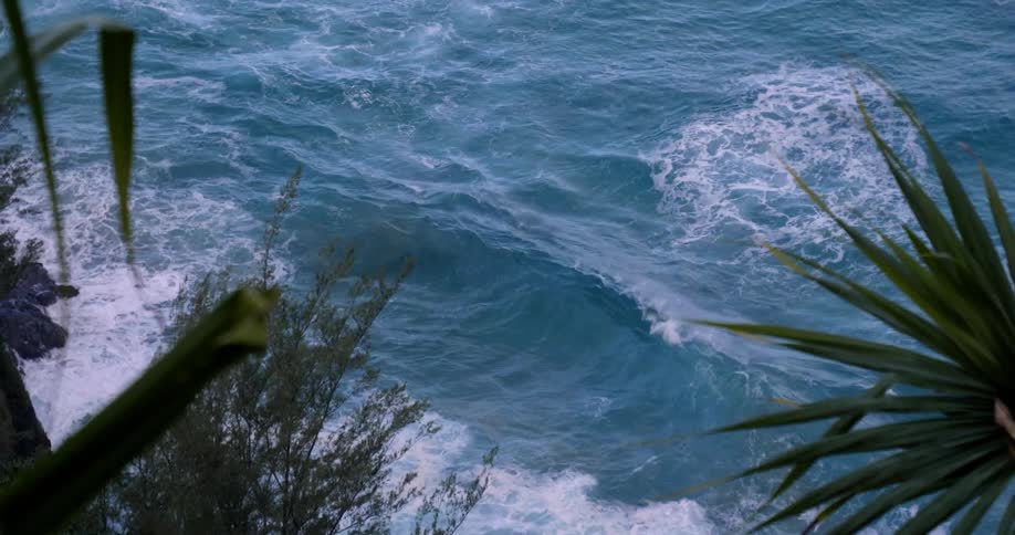 Ocean waves flow just off the coast