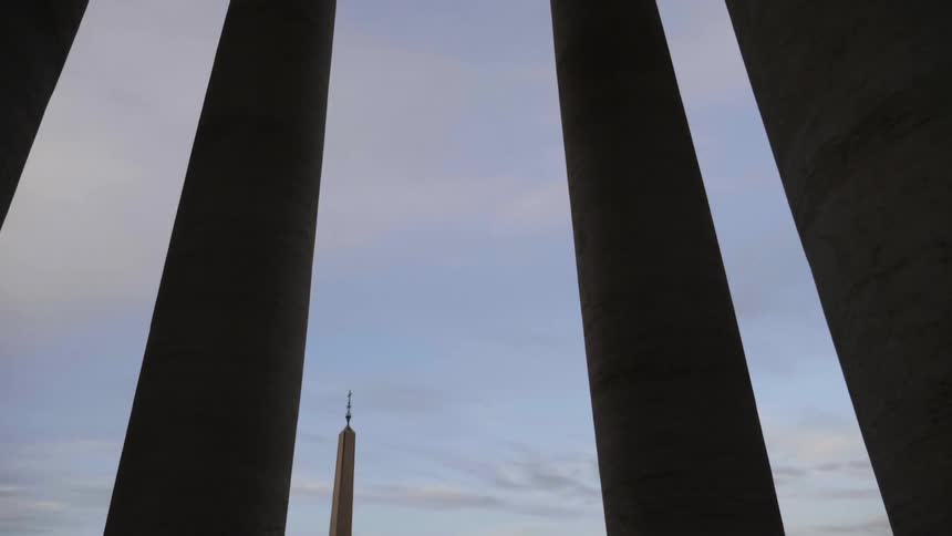 View looking through pillars out into the city