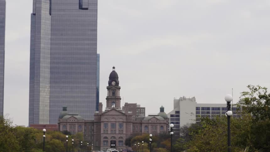 Courthouse with a tall skyscraper behind it