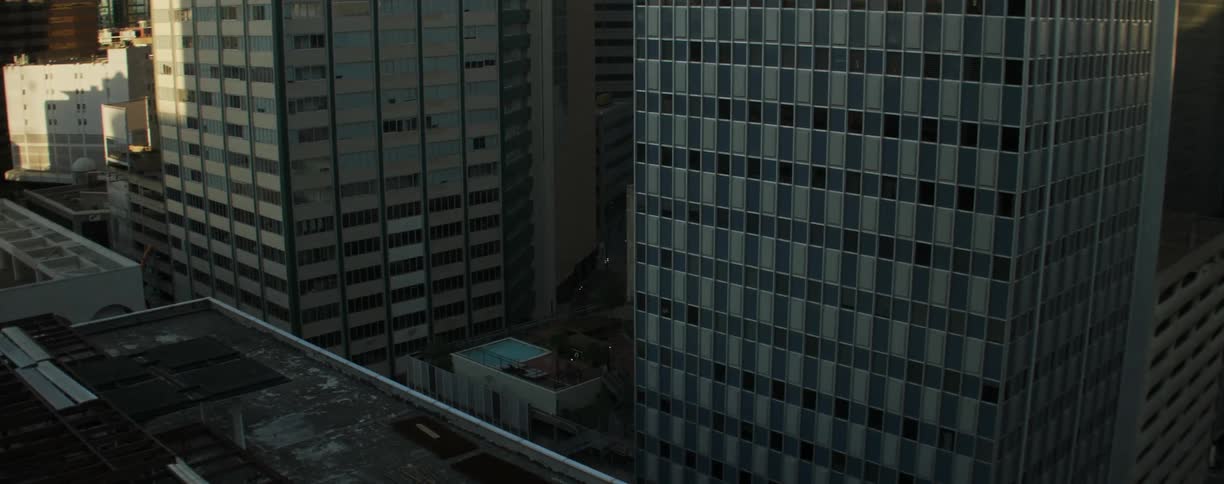 Skyscrapers downtown in a city at sunset