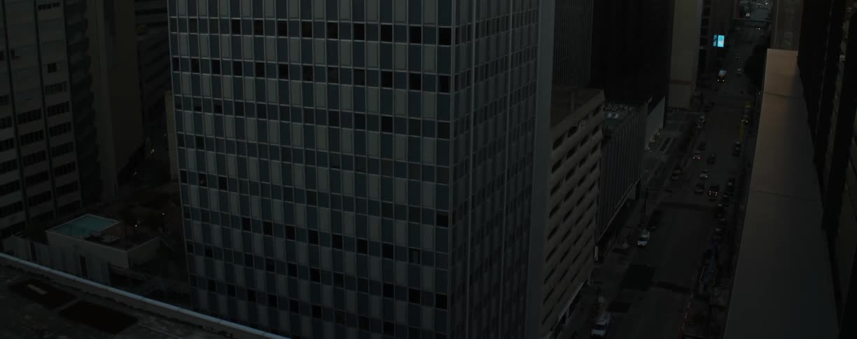 Shadows cover a city block at dusk or dawn