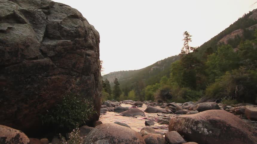 Water flows in a rocky mountain stream