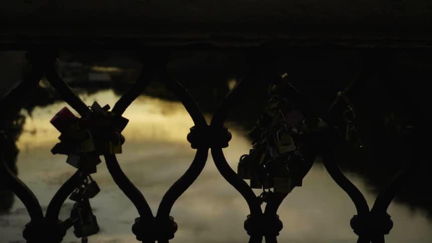 Close up of an ornate fence outside at sunset