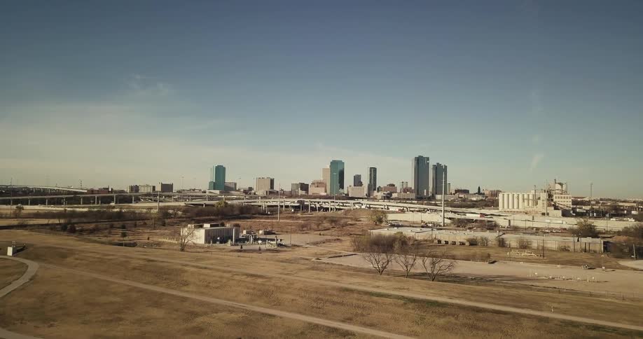 View of a city far off with highways in front