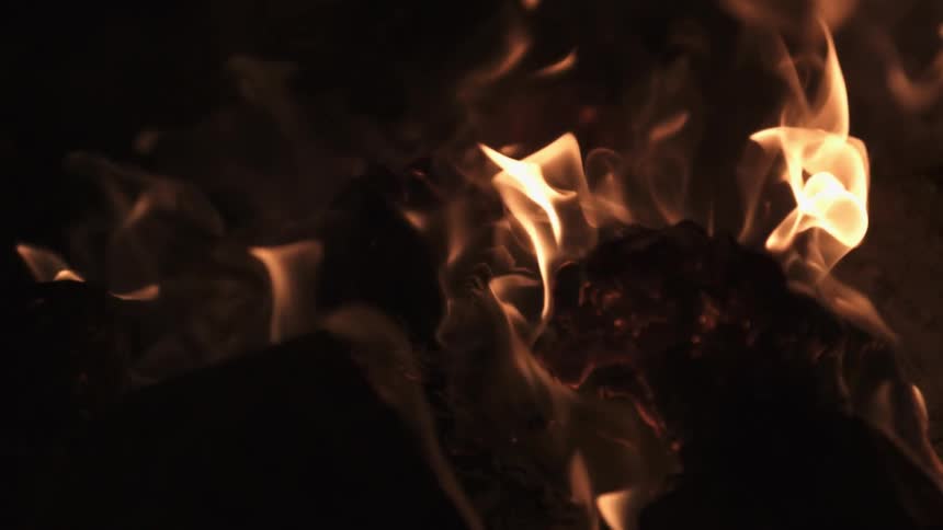 Close up of fire burning at night
