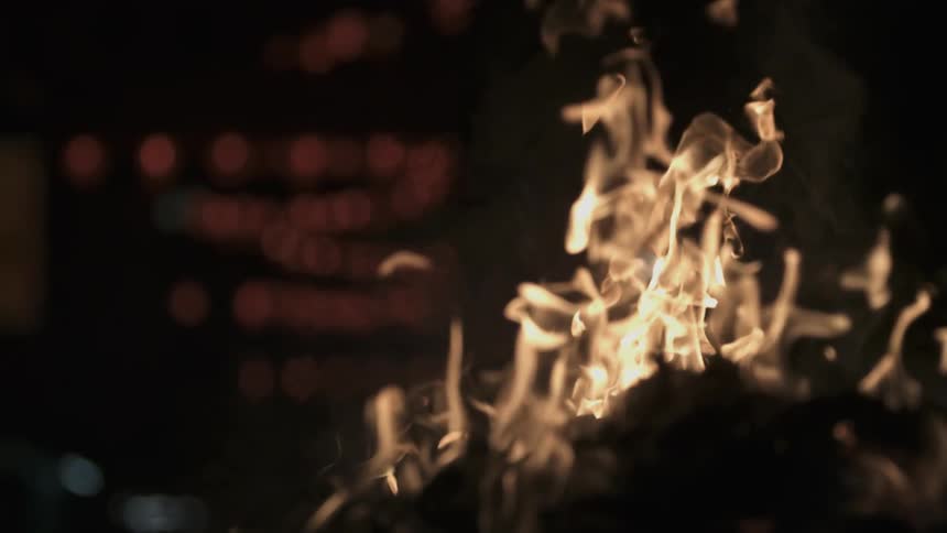 Fire burning brightly at night