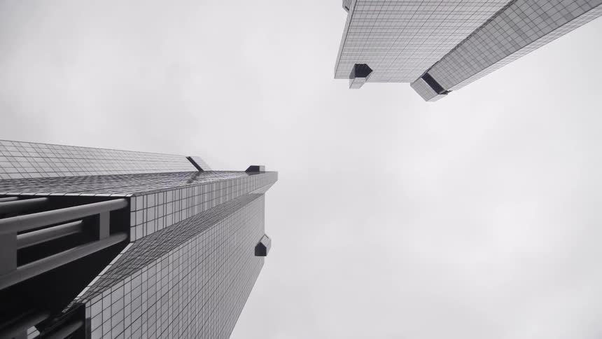 City skyscrapers tower overhead
