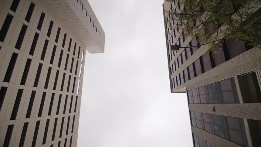Two tall buildings facing each other