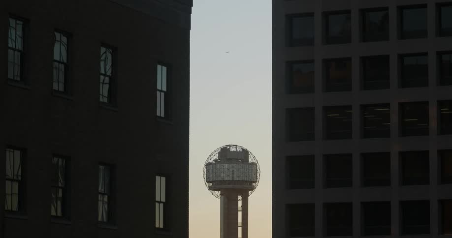 Close up of two buildings at sunset