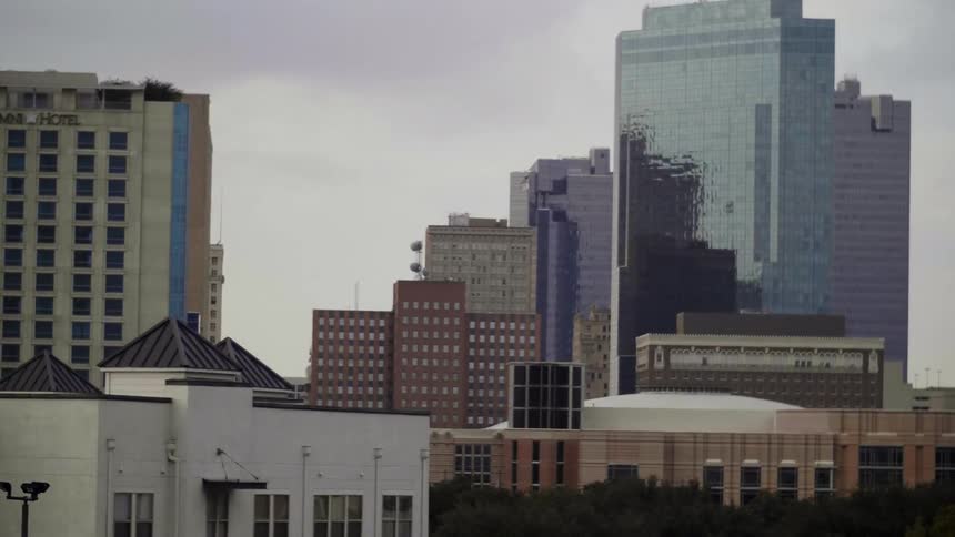 The tall building in this city has reflective windows