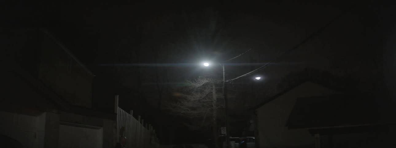 Street light shines at night