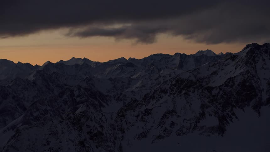 View of rocky mountains at sunset