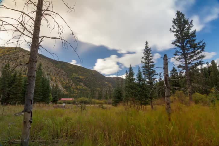 There is a house by the foot of the mountain ahead