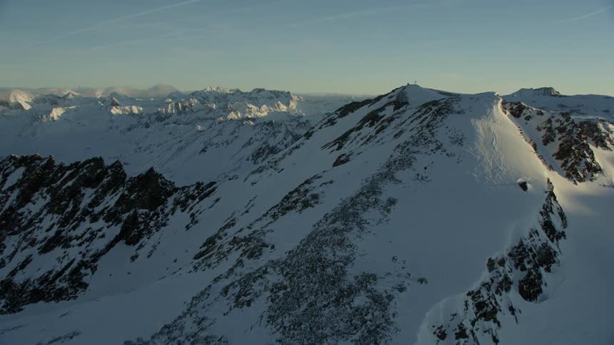 View of snowy mountains at sunset