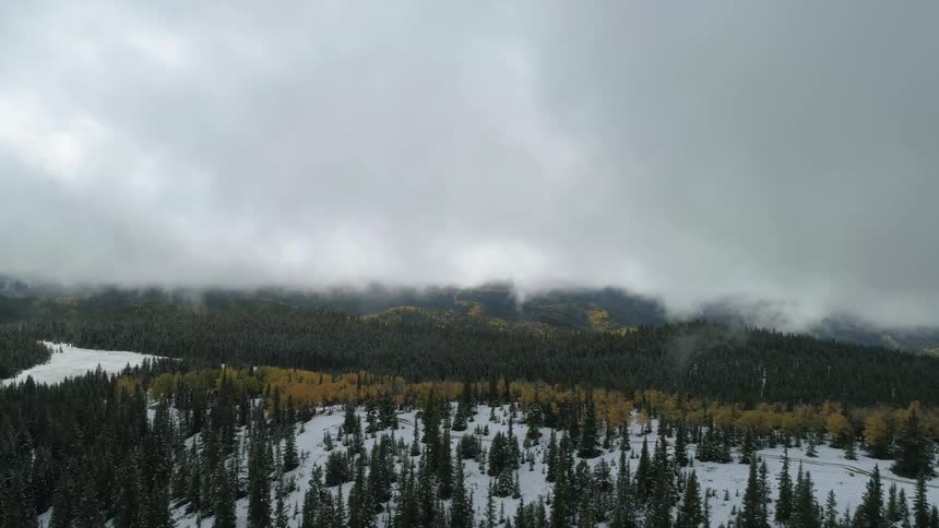 Heavy clouds are passing over the wilderness ahead
