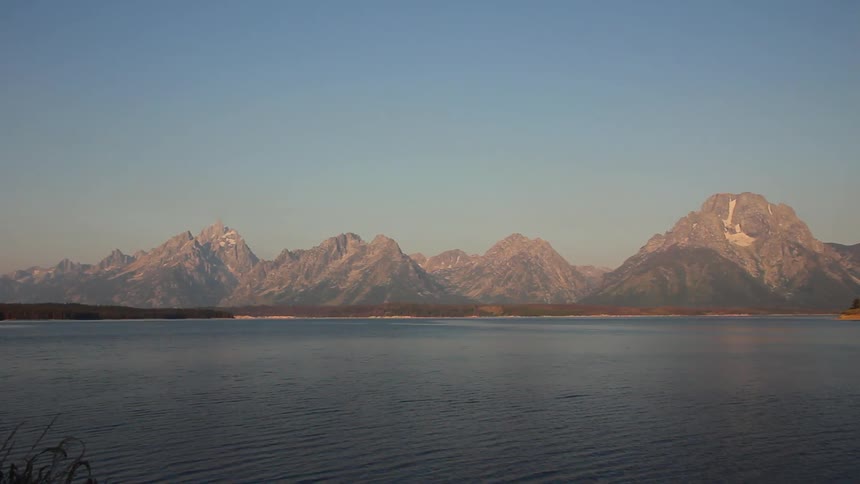 Past the lake is a vast mountain range