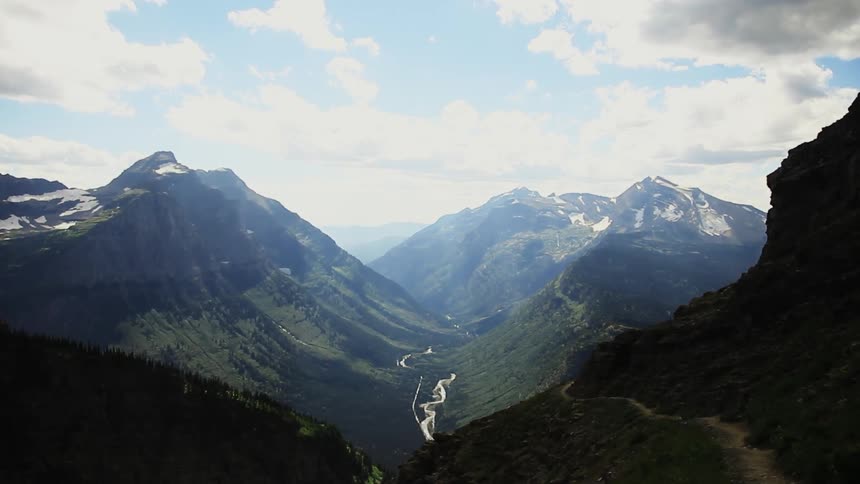There is a stream running along the center of these mountains