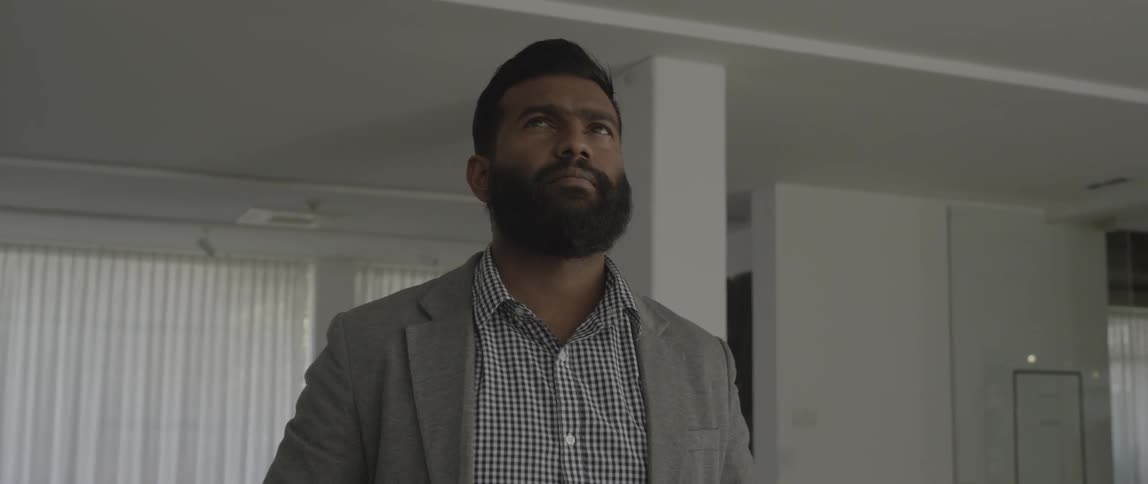 Man standing in the middle of a room