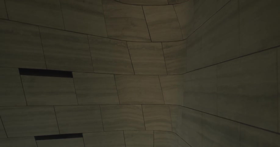 The tunnel is surrounded by tile walls