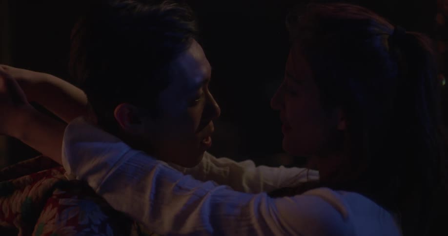 Man and woman dancing together and singing to each other