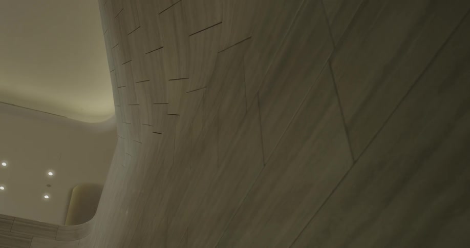 The wall is tiled with lights in the distance