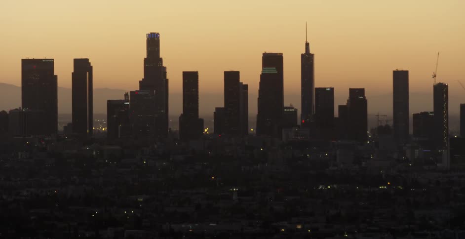 View of a city skyline at sunset
