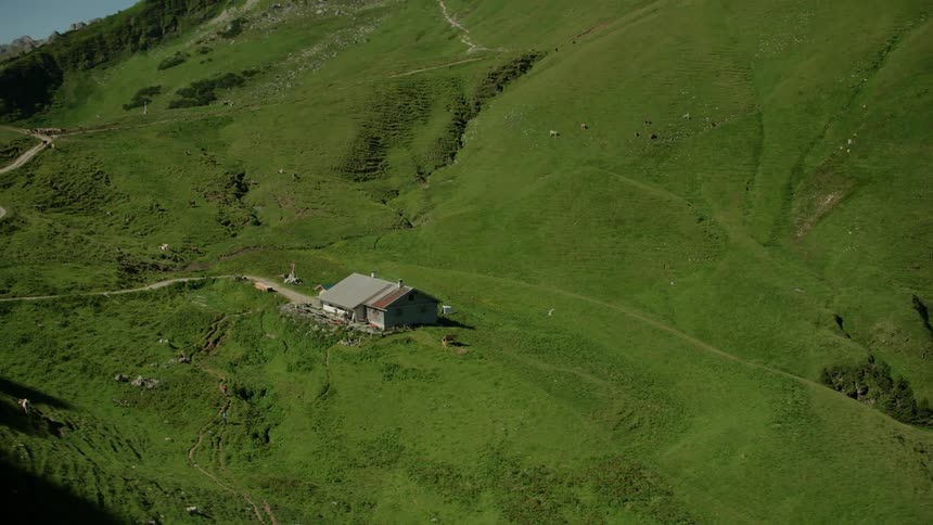 Aerial view of a house in the mountains