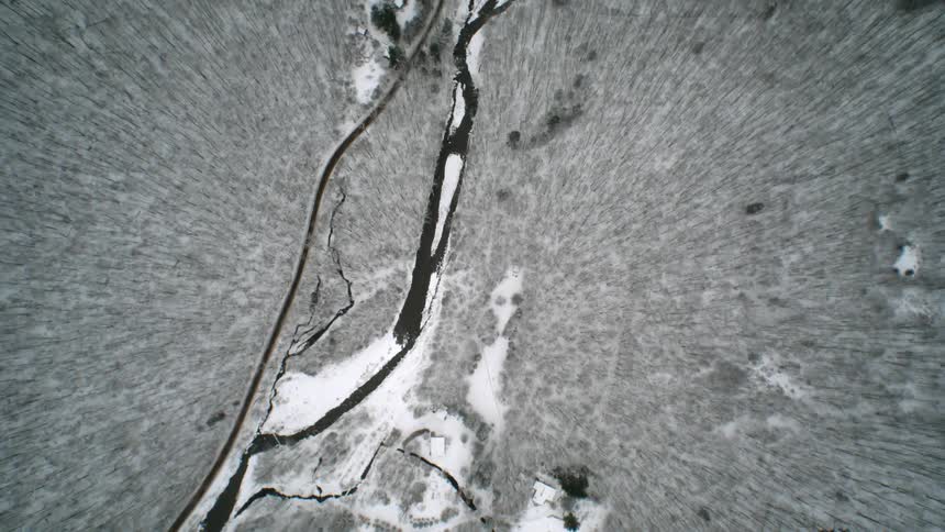 Streams connect below on the frost covered wilderness