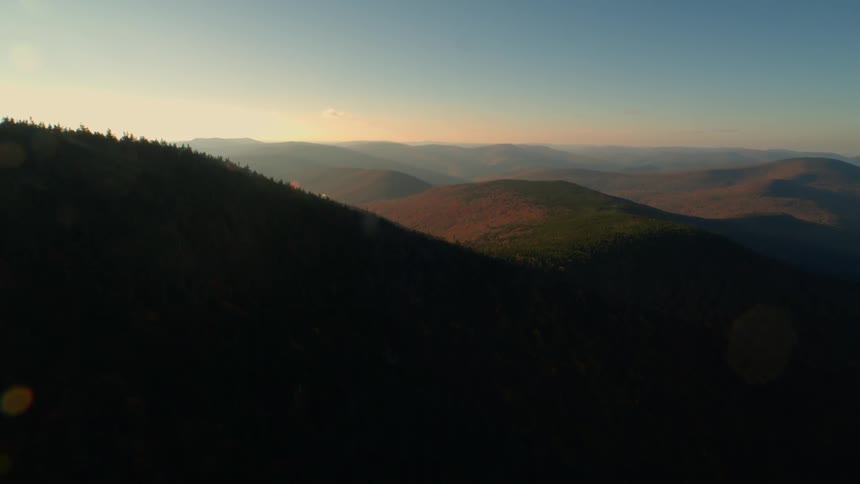 The mountain is completely covered with shadows below