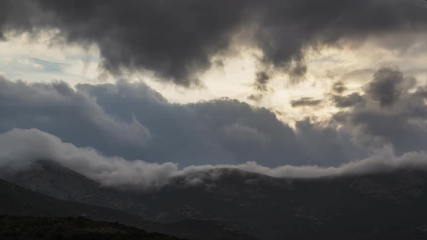The sky is full of large moving clouds