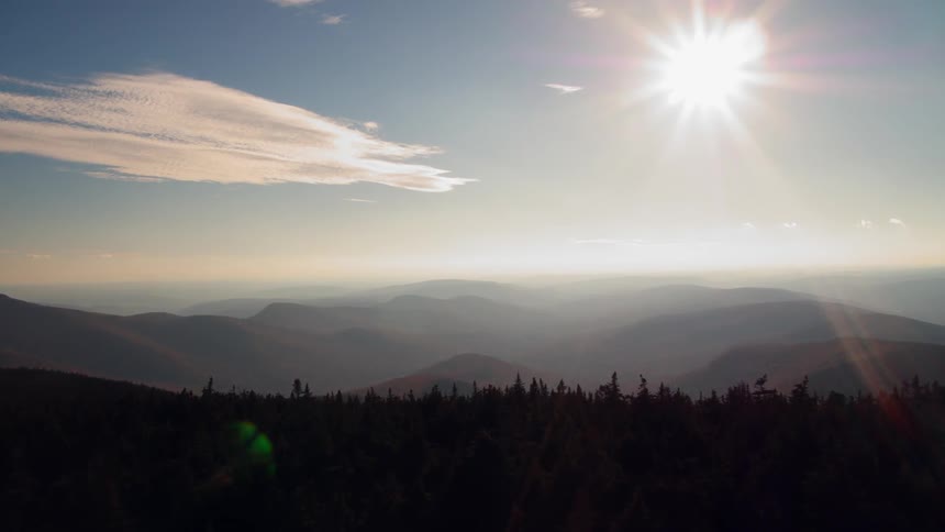 Sun shining over mountain wilderness