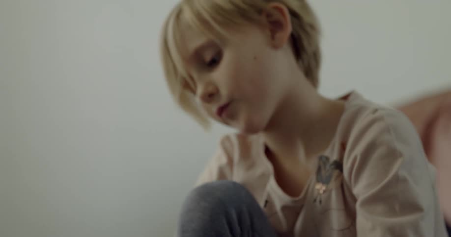 Close up of a child looking down