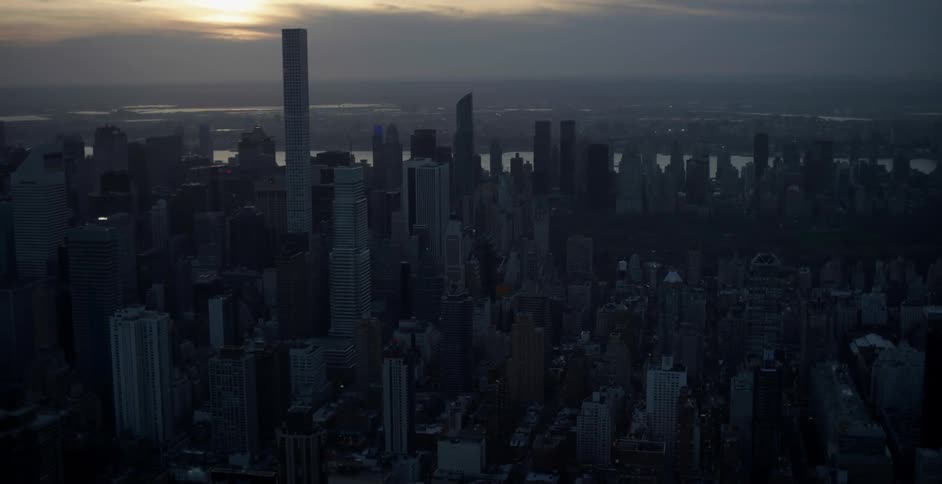 An aerial view of a large city at dusk