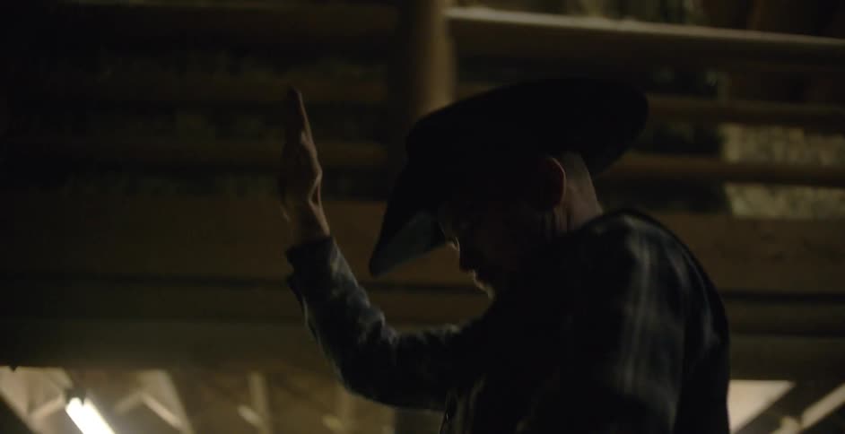 A man is riding a mechanical bull