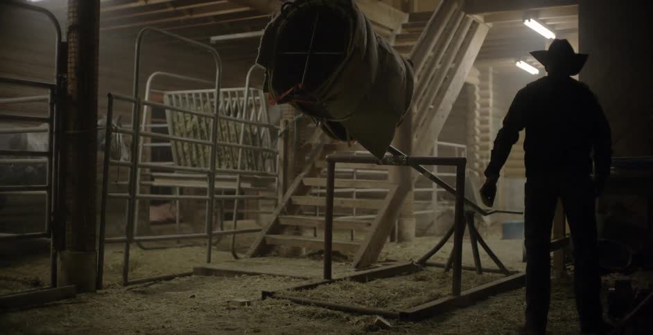 A man jumps off a mechanical bull