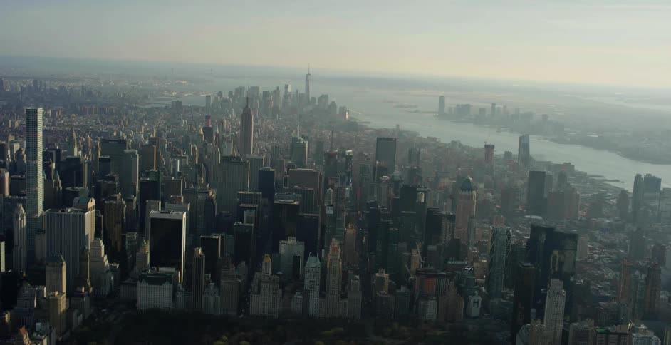 Skyscrapers and buildings loom in the distance