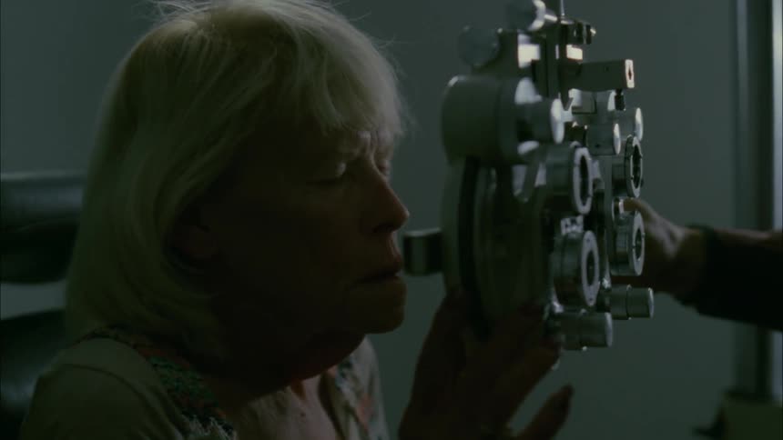 A woman is getting an eye exam