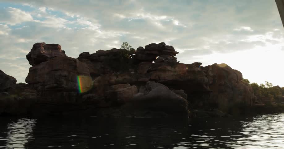 Rock formations next to a body of water
