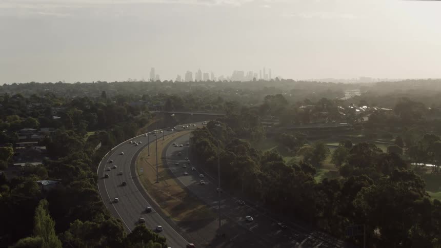 Looking down on a busy freeway with lots of cars