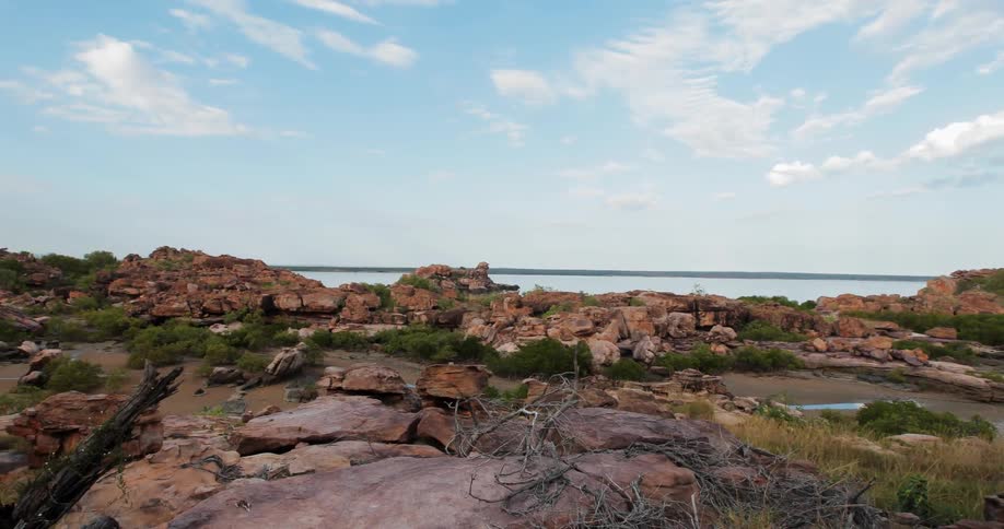 Blue sky over a rocky shore line