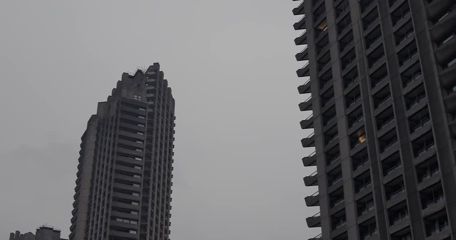 Lights shine in a couple of skyscraper windows