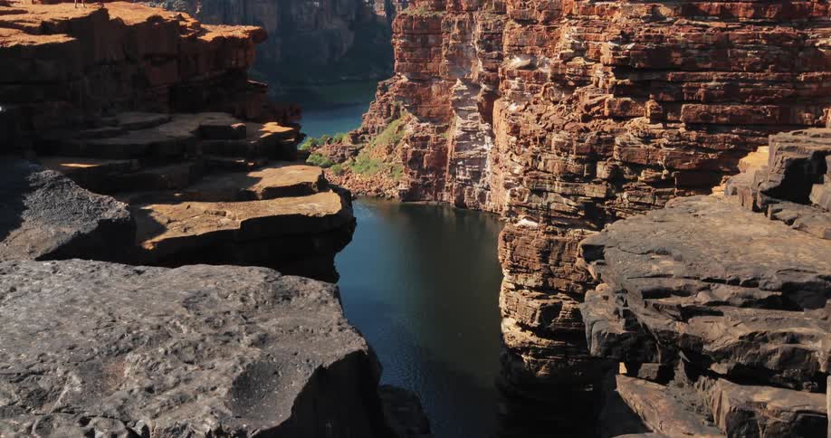 Water flows between two cliffs